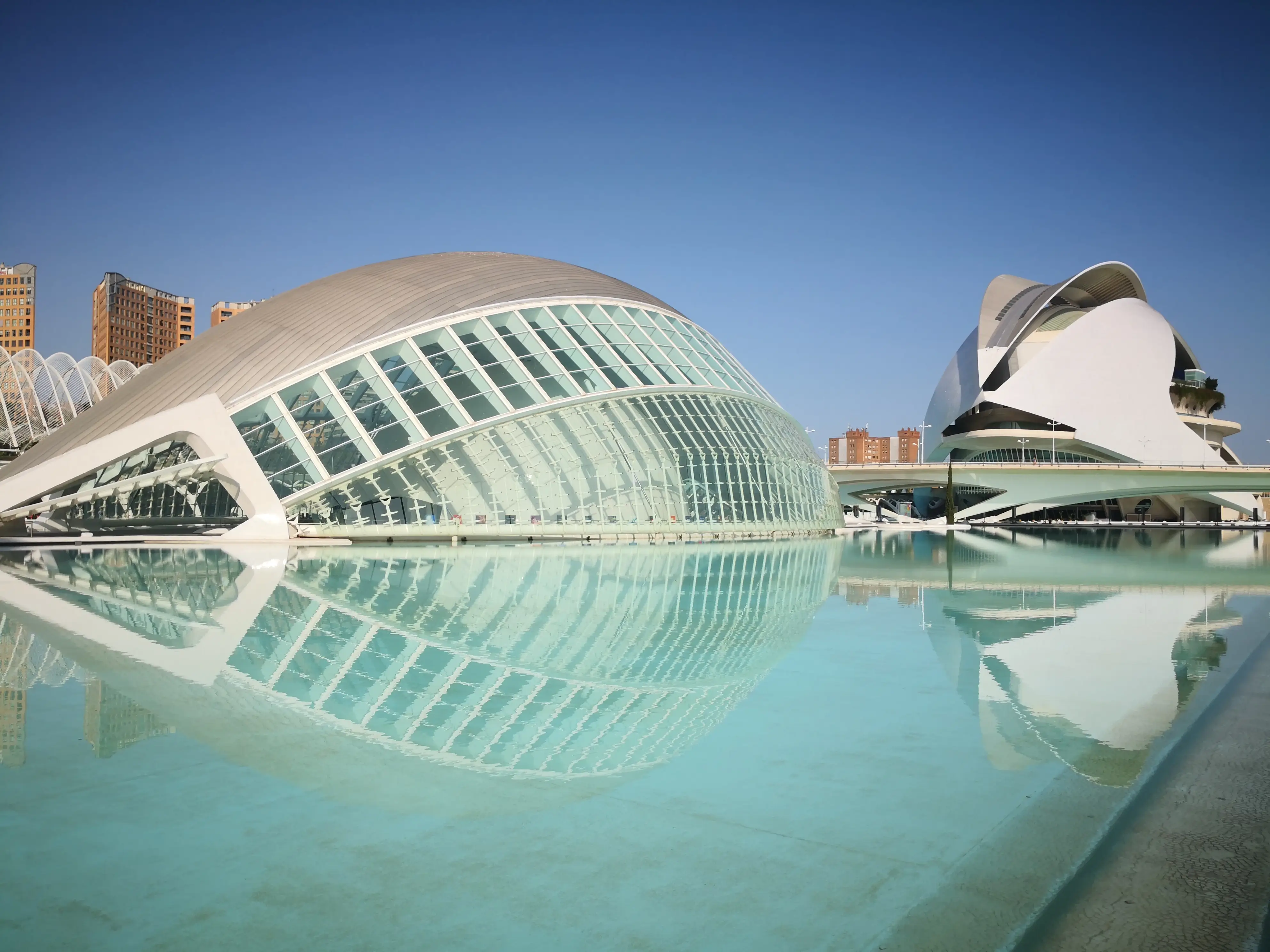 The Hemisfèric of Valencia's City of Arts and Sciences reflected in its pool